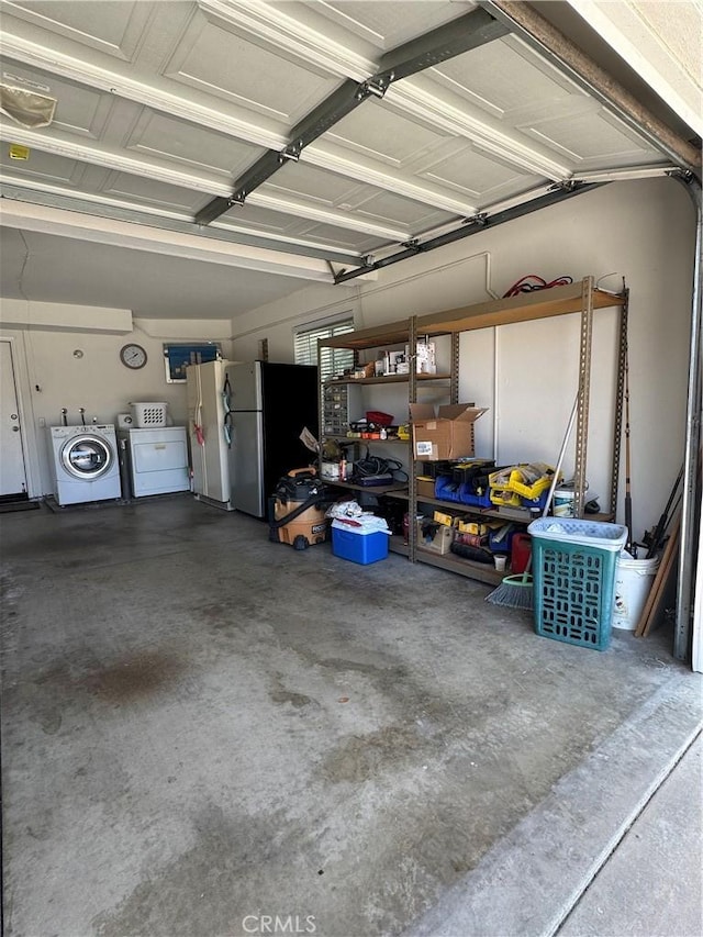 2801 Woodview Ct, Walnut, CA 91789 - garage featuring independent washer and dryer and freestanding refrigerator