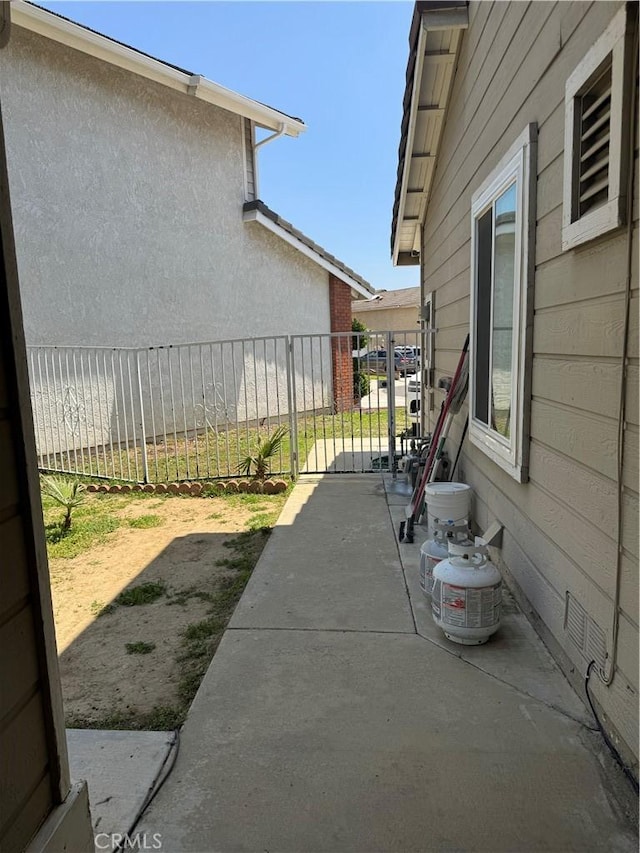 view of patio with fence
