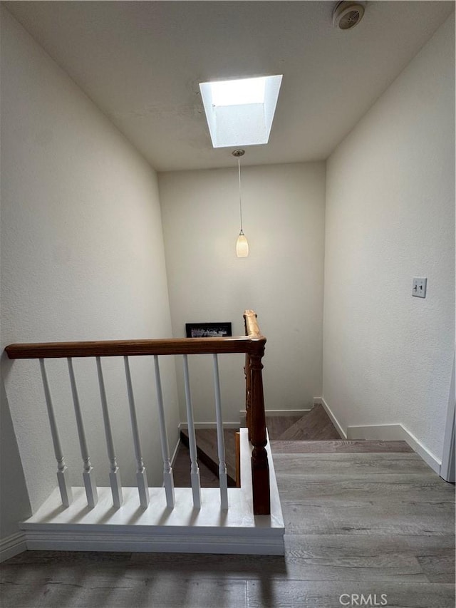 2801 Woodview Ct, Walnut, CA 91789 - staircase with a skylight and wood finished floors