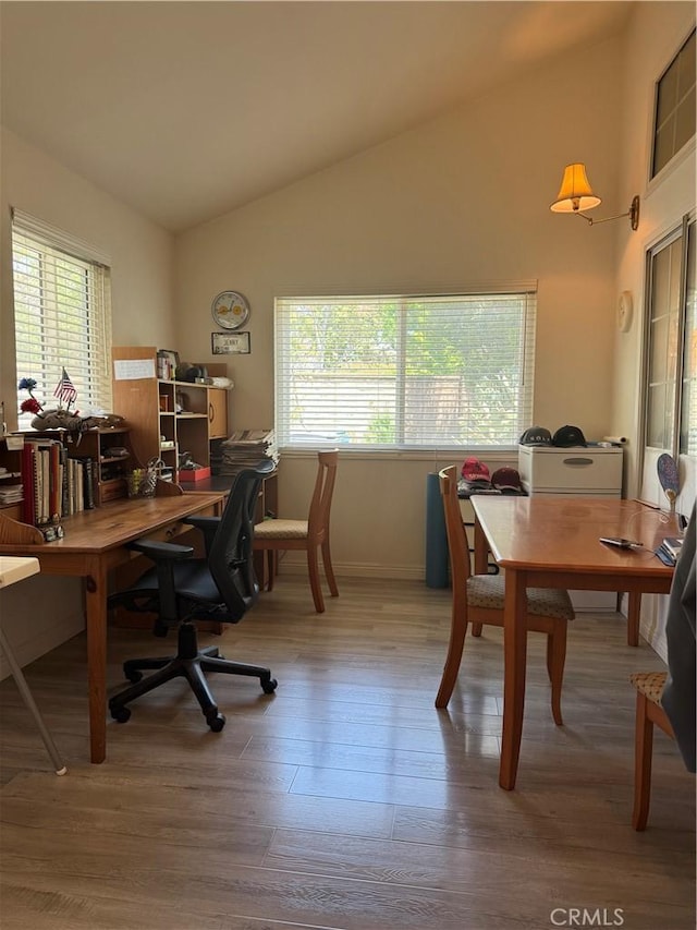 2801 Woodview Ct, Walnut, CA 91789 - office area featuring lofted ceiling, plenty of natural light, and wood finished floors