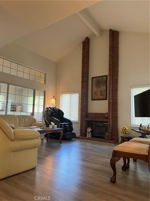 2801 Woodview Ct, Walnut, CA 91789 - living room with high vaulted ceiling, beamed ceiling, wood finished floors, plenty of natural light, and a fireplace