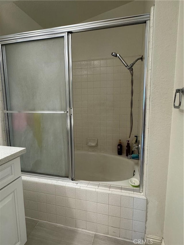 2801 Woodview Ct, Walnut, CA 91789 - bathroom featuring tiled shower / bath combo and vanity