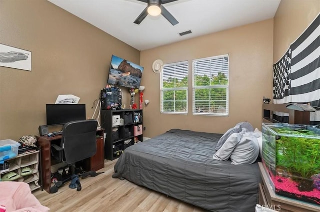 1232 Tucson Ave, Norco, CA 92860 - bedroom with wood finished floors, a ceiling fan, and an office area