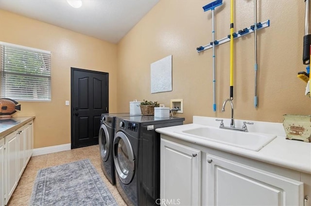 1232 Tucson Ave, Norco, CA 92860 - laundry area with cabinet space, washing machine and dryer, baseboards, and light tile patterned flooring