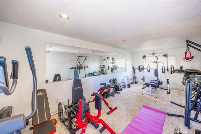 gym with recessed lighting and carpet flooring