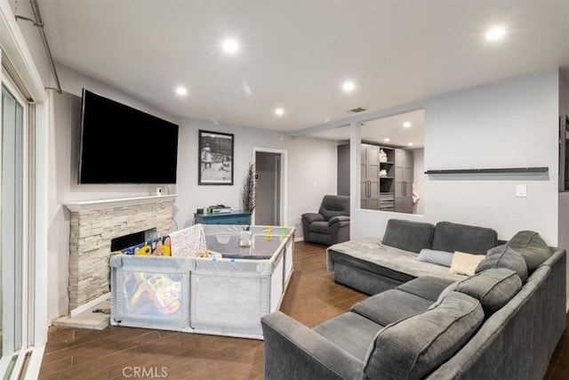 4034 Durfee Ave, Pico Rivera, CA 90660 - living room with wood finished floors, recessed lighting, and a fireplace