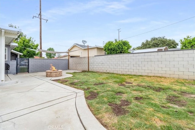 4034 Durfee Ave, Pico Rivera, CA 90660 - view of yard featuring an outdoor fire pit and a patio area