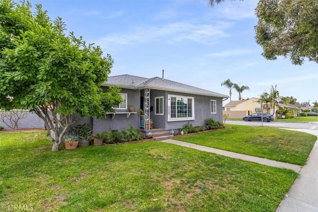4034 Durfee Ave, Pico Rivera, CA 90660 - bungalow with stucco siding and a front lawn