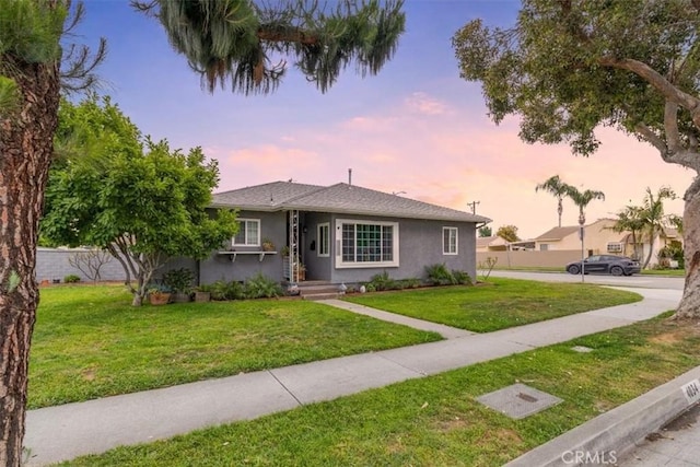 4034 Durfee Ave, Pico Rivera, CA 90660 - bungalow featuring stucco siding and a yard