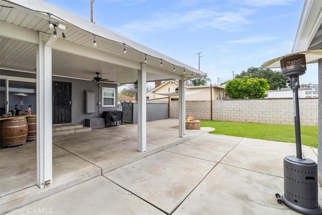 4034 Durfee Ave, Pico Rivera, CA 90660 - view of patio / terrace with an outdoor fire pit, a ceiling fan, a fenced backyard, and a grill