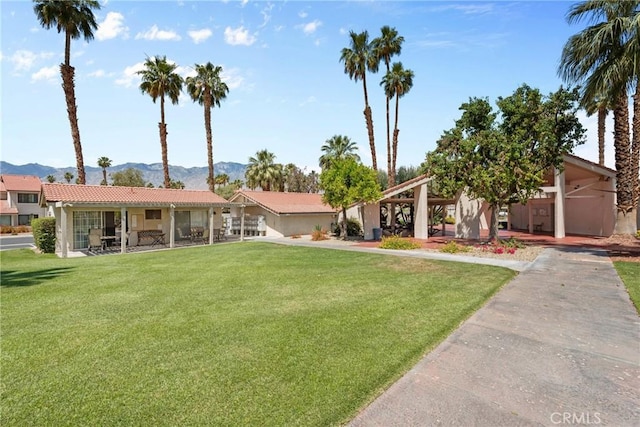 6134 Arroyo Rd Unit 3, Palm Springs, CA 92264 - view of front of home featuring a front lawn and a mountain view
