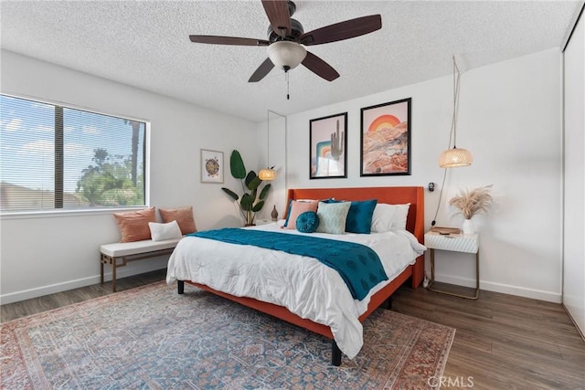 6134 Arroyo Rd Unit 3, Palm Springs, CA 92264 - bedroom with wood finished floors, a textured ceiling, baseboards, and a ceiling fan