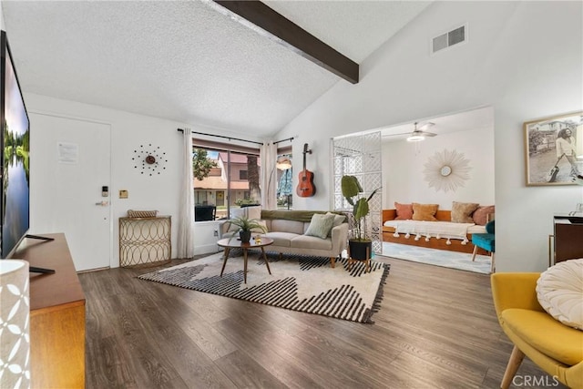 6134 Arroyo Rd Unit 3, Palm Springs, CA 92264 - living room featuring wood finished floors, beam ceiling, a textured ceiling, ceiling fan, and high vaulted ceiling