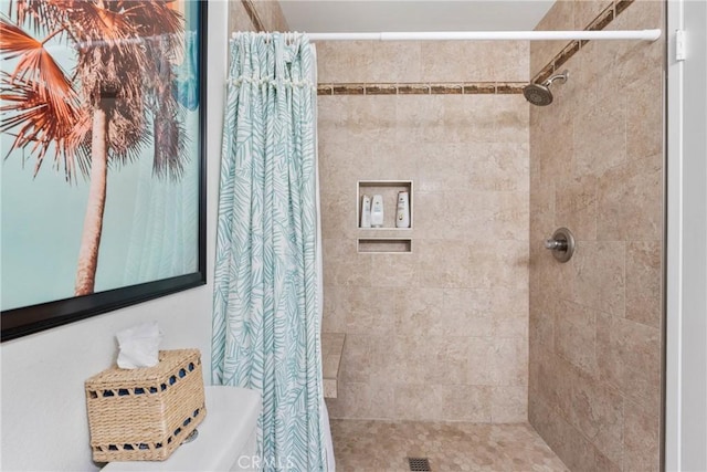 6134 Arroyo Rd Unit 3, Palm Springs, CA 92264 - bathroom featuring a tile shower and toilet