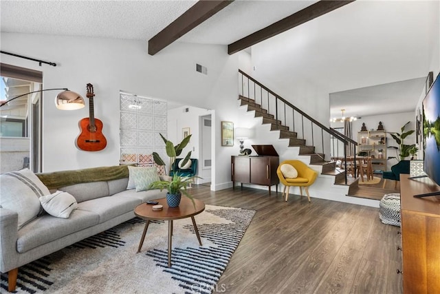 6134 Arroyo Rd Unit 3, Palm Springs, CA 92264 - living area featuring stairway, wood finished floors, a chandelier, and baseboards