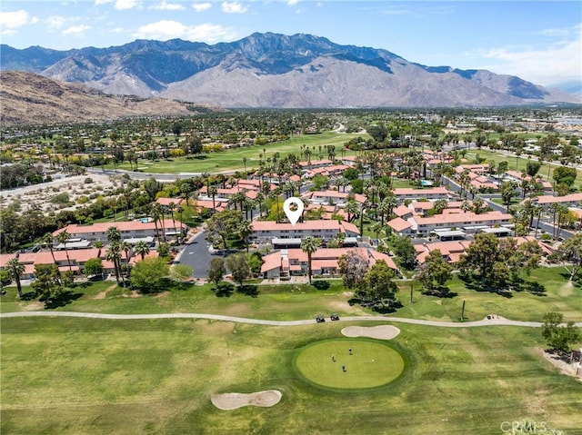 6134 Arroyo Rd Unit 3, Palm Springs, CA 92264 - aerial perspective of suburban area featuring a golf course and a mountain backdrop