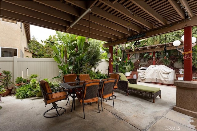 970 Riverview Cir, Corona, CA 92881 - view of patio with outdoor dining space, a fenced backyard, grilling area, and a pergola