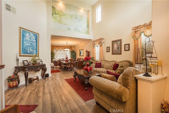 970 Riverview Cir, Corona, CA 92881 - living area with a towering ceiling and wood-type flooring