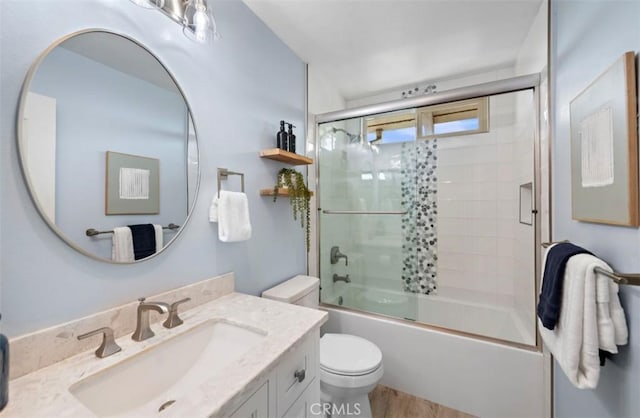 206 Avenida Adobe, San Clemente, CA 92672 - bathroom with toilet, vanity, combined bath / shower with glass door, and wood finished floors