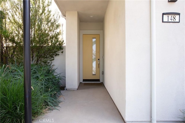 148 Spectacle, Irvine, CA 92618 - entrance to property with stucco siding