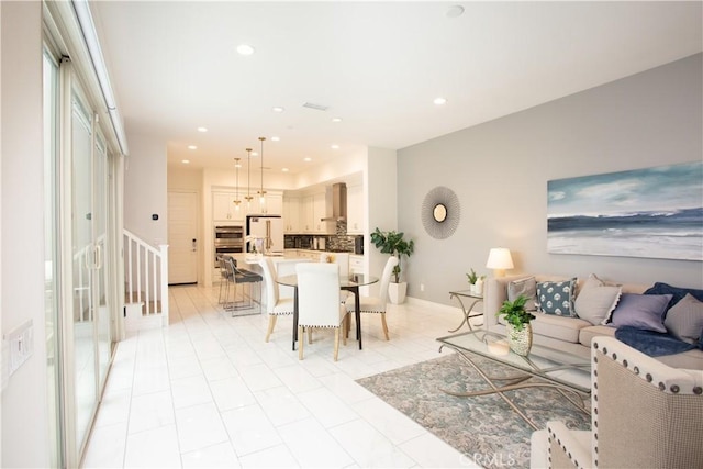 148 Spectacle, Irvine, CA 92618 - living area with stairway and recessed lighting