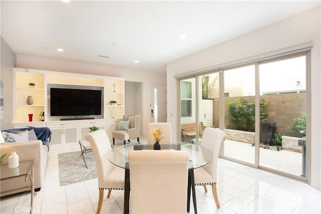 148 Spectacle, Irvine, CA 92618 - dining space featuring light marble finish flooring and recessed lighting