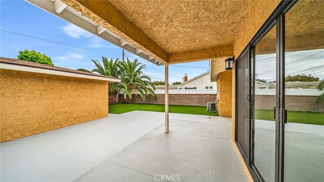 view of patio / terrace featuring a fenced backyard and central air condition unit