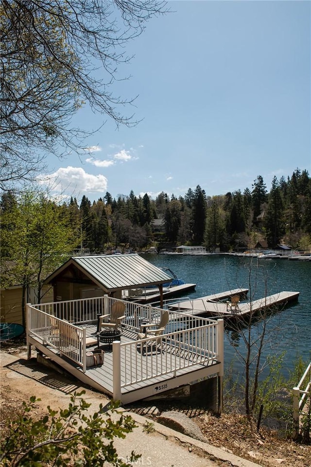 28956 Palisades Dr, Lake Arrowhead, CA 92352 - dock area featuring a wooded view and a water view