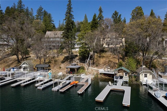 28956 Palisades Dr, Lake Arrowhead, CA 92352 - dock with a gazebo, a water view, and view of wooded area