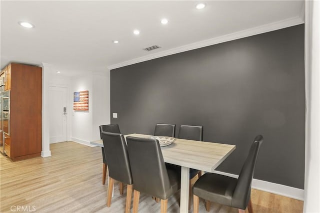 515 Traverse Dr, Costa Mesa, CA 92626 - dining area featuring ornamental molding, recessed lighting, light wood-type flooring, and baseboards