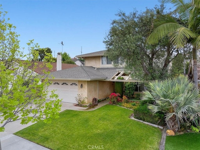 19923 Mildred Ave, Torrance, CA 90503 - view of front of house with stucco siding, a garage, a front yard, driveway, and a chimney