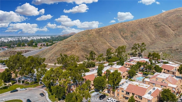 aerial view of residential area with mountains
