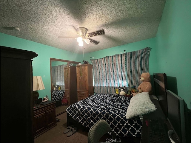 7477 Corona Ave, Hesperia, CA 92345 - bedroom featuring a textured ceiling, carpet, and a ceiling fan