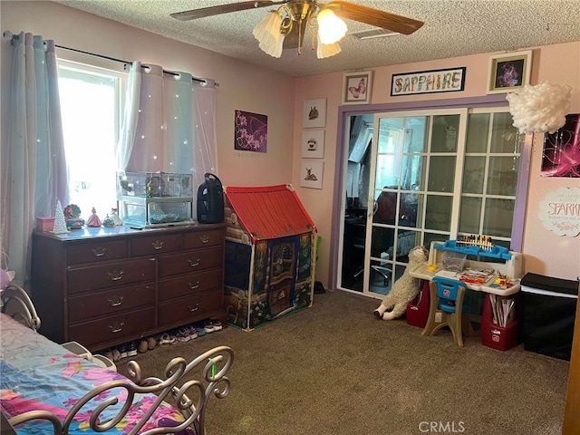 7477 Corona Ave, Hesperia, CA 92345 - carpeted bedroom with a textured ceiling and ceiling fan