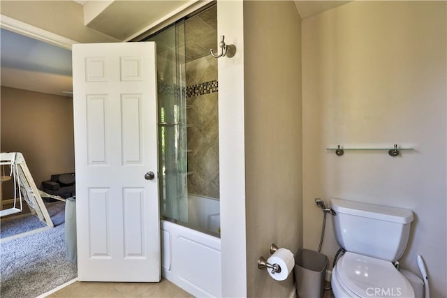 30681 Southern Cross Rd, Temecula, CA 92592 - full bathroom featuring combined bath / shower with glass door, toilet, and tile patterned floors
