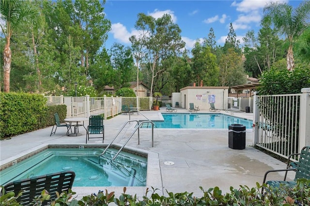 22800 Hilton Head Dr Unit 305, Diamond Bar, CA 91765 - community pool with a patio area, view of scattered trees, and a hot tub