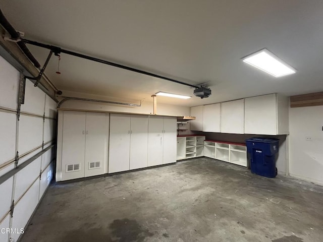 677 County Square Dr, Ventura, CA 93003 - garage featuring a garage door opener