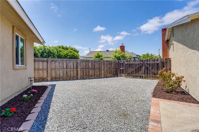 10319 Hemphill Ct, San Diego, CA 92126 - fenced backyard with a patio area