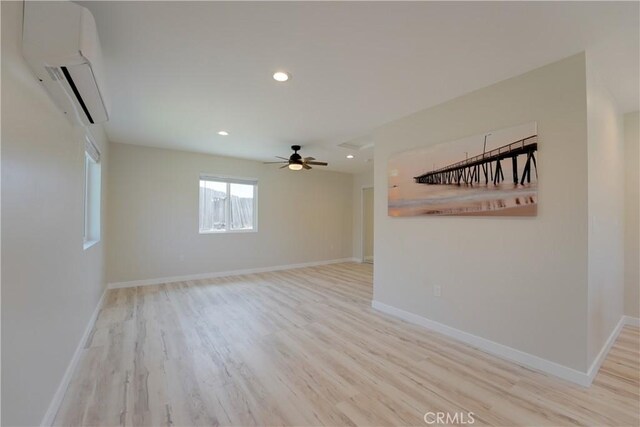 10319 Hemphill Ct, San Diego, CA 92126 - empty room featuring wood finished floors, a ceiling fan, baseboards, recessed lighting, and a wall mounted AC