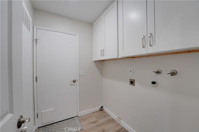 10319 Hemphill Ct, San Diego, CA 92126 - washroom with gas dryer hookup, electric dryer hookup, cabinet space, light wood finished floors, and washer hookup