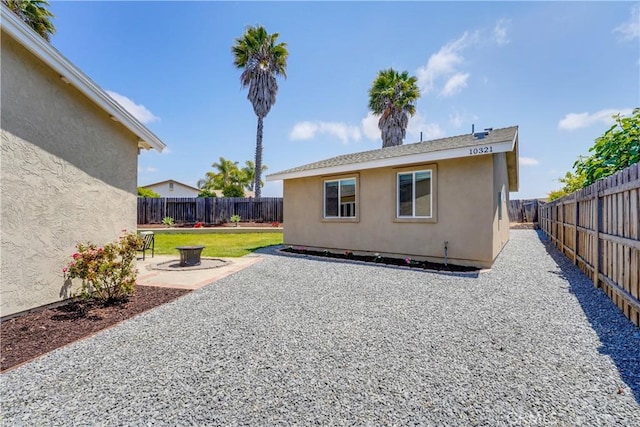 10319 Hemphill Ct, San Diego, CA 92126 - back of property featuring stucco siding, a patio area, and a fenced backyard