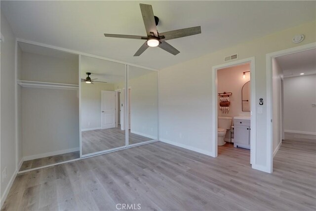 10319 Hemphill Ct, San Diego, CA 92126 - unfurnished bedroom featuring light wood-type flooring, a closet, and baseboards