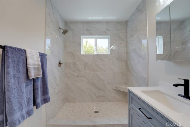 10319 Hemphill Ct, San Diego, CA 92126 - full bathroom featuring vanity and a tile shower