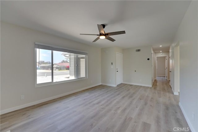 10319 Hemphill Ct, San Diego, CA 92126 - unfurnished living room with a ceiling fan, light wood-style flooring, and baseboards