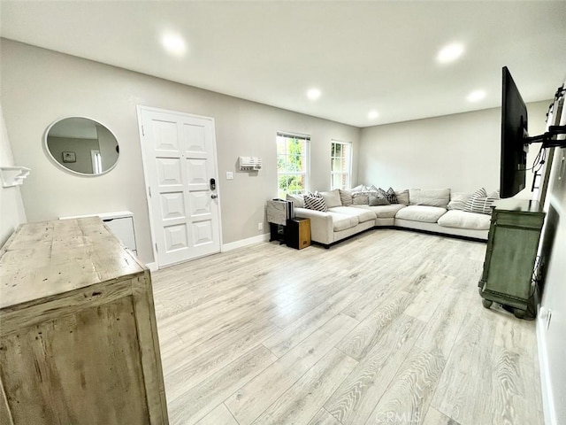 738 N Fairhaven St, Anaheim, CA 92801 - living area featuring light wood finished floors, recessed lighting, and baseboards