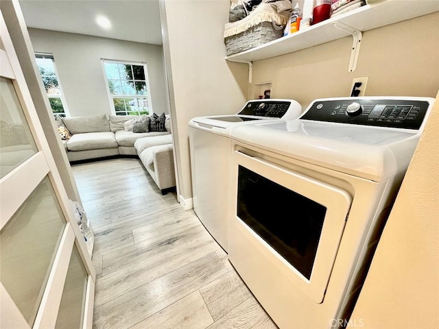 738 N Fairhaven St, Anaheim, CA 92801 - laundry area with washer and dryer, light wood-style floors, and recessed lighting