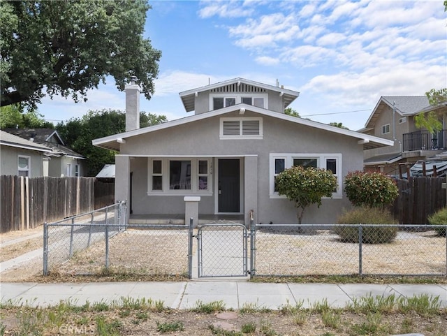 1810 Park St, Paso Robles, CA 93446 - bungalow with a gate, a fenced front yard, and stucco siding