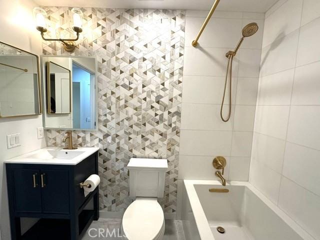 1428 Brett Pl Unit 86, San Pedro, CA 90732 - bathroom featuring tile walls, washtub / shower combination, toilet, vanity, and a chandelier