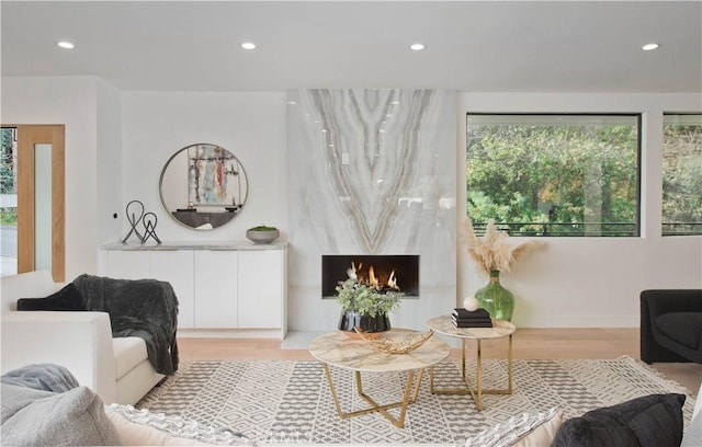 3920 Weslin Ave, Sherman Oaks, CA 91423 - living area featuring recessed lighting, light wood-style flooring, and a premium fireplace