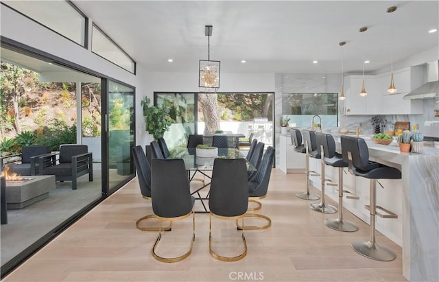 3920 Weslin Ave, Sherman Oaks, CA 91423 - dining room featuring light wood finished floors and recessed lighting
